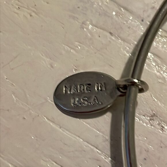 7.5” silver tone bangle bracelet with silver tone nautical charm - Picture 7 of 10